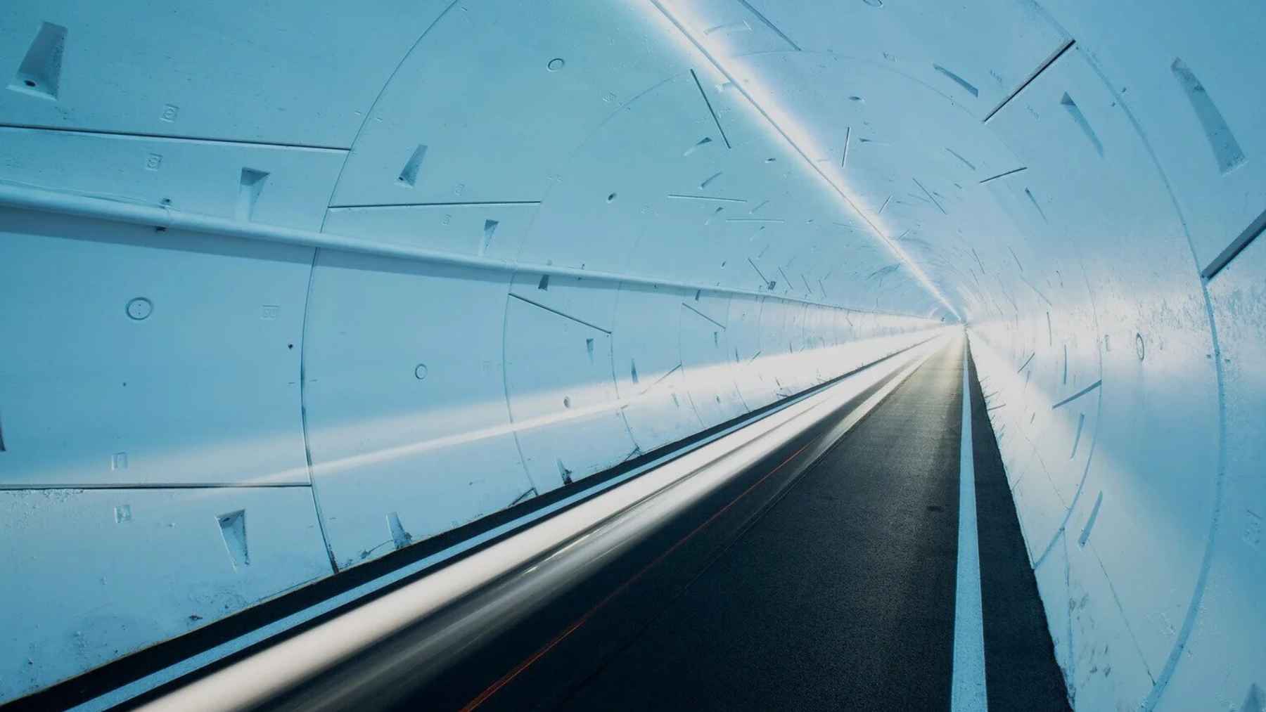 Modern underground tunnel interior representing the concept of a proposed pedestrian crossing beneath the Panama Canal.