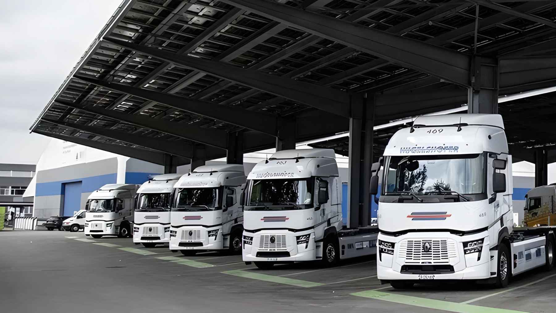Electric semi truck charging at depot during long distance logistics operations in Switzerland
