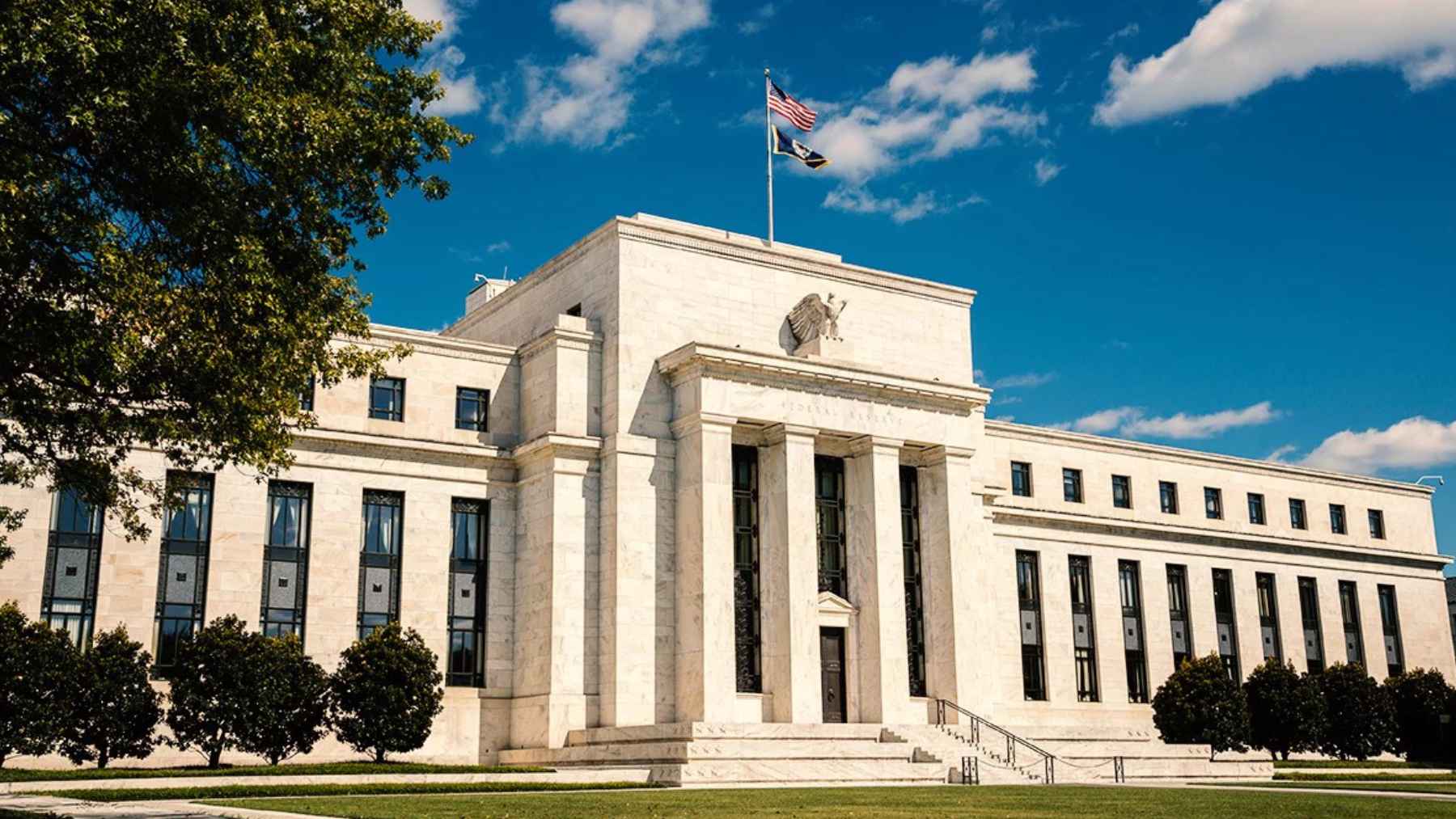 Industrial oil refinery facility with pipelines and processing towers, symbolizing energy prices driving inflation concerns