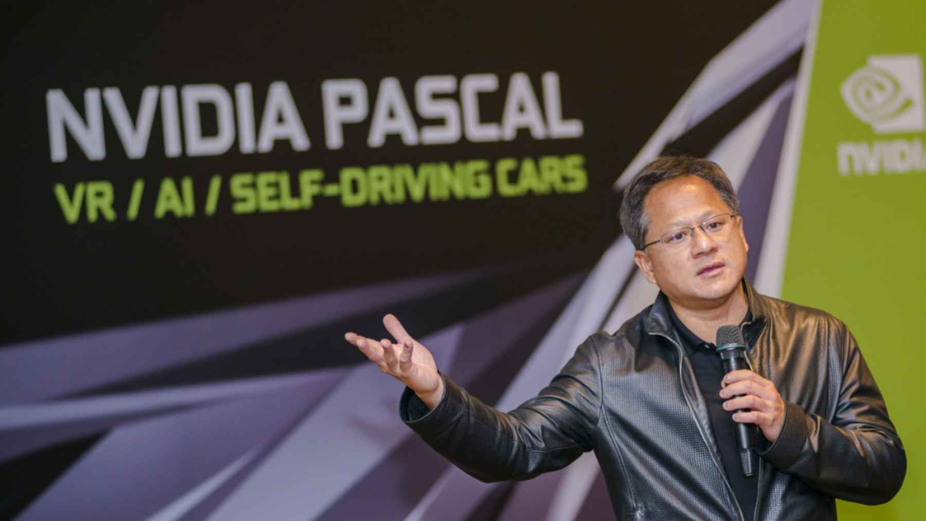 Jensen Huang speaking at Nvidia event about AI, self-driving cars, and future computing technologies