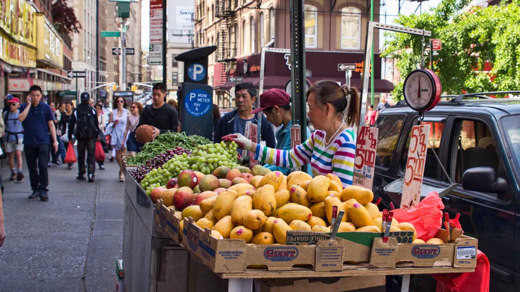 Street fruit vendor in New York with fresh produce as rising food prices impact everyday grocery costs