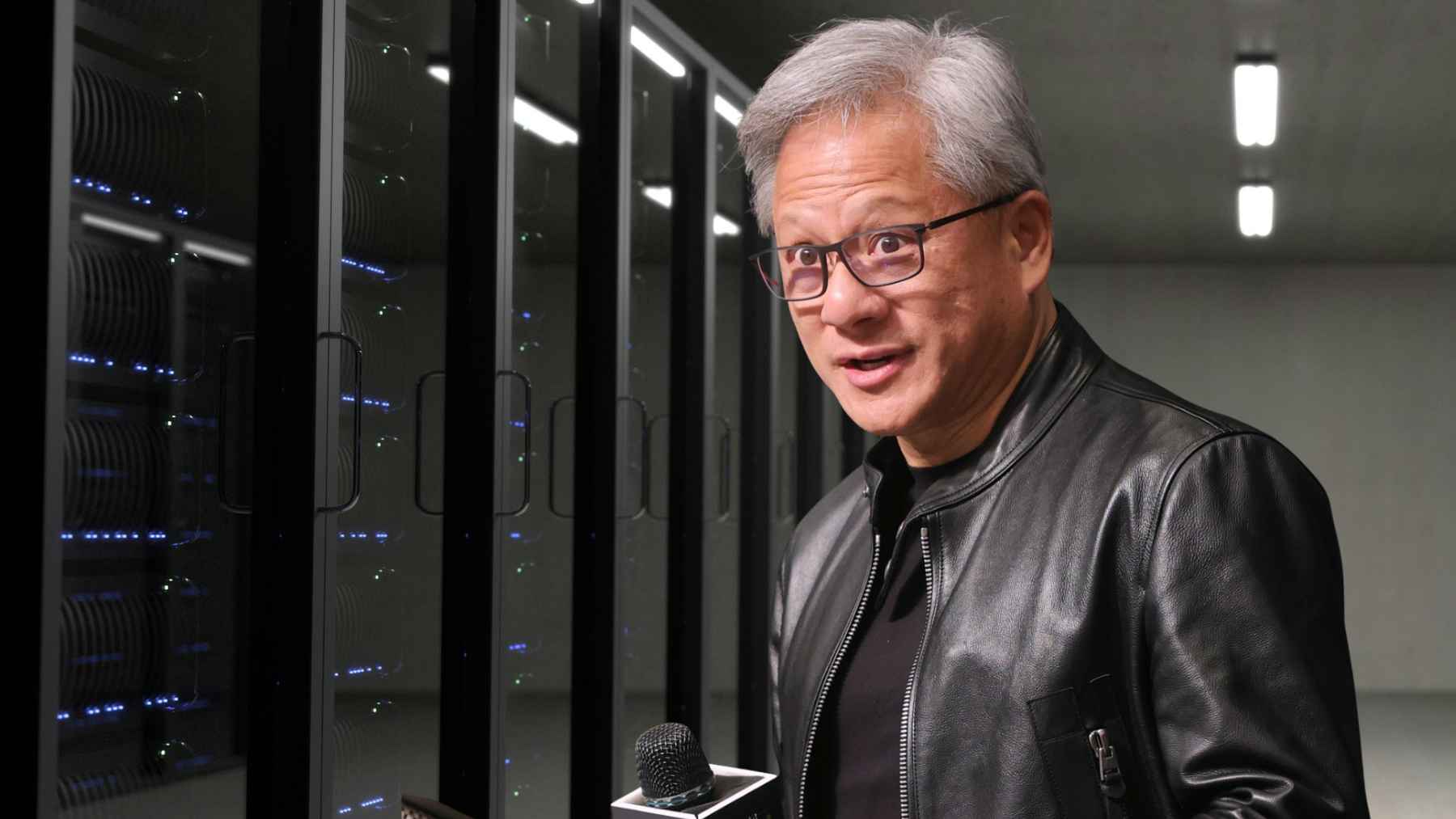 Nvidia CEO Jensen Huang presenting AI agents and enterprise computing strategy at GTC conference