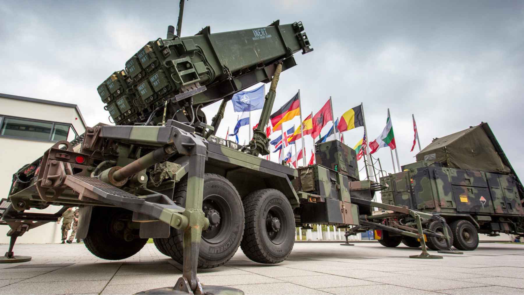 Patriot missile defense system launcher deployed in a military setting, highlighting shifting air defense resources from Europe to the Middle East