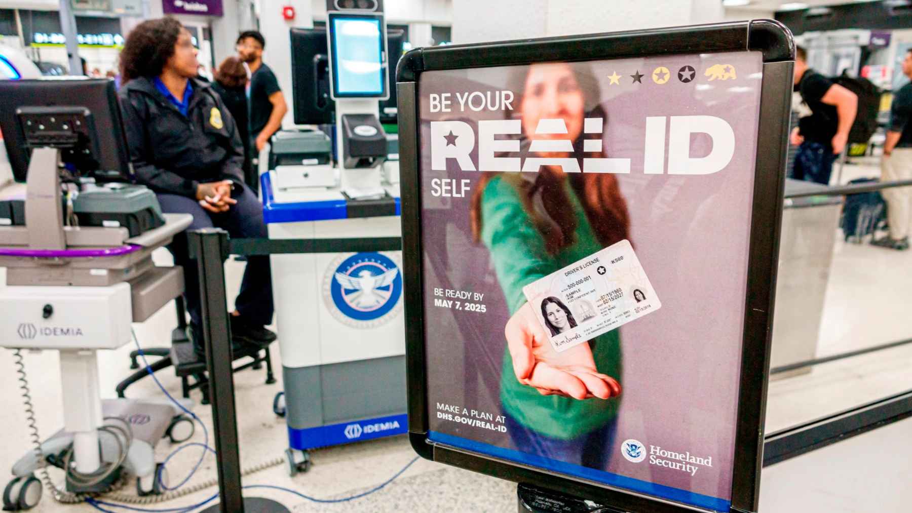 Since February 1, traveling without this document can cost you $45, and many people still don't know it 1 Traveler holding a REAL ID compliant driver’s license, illustrating TSA identification rules for domestic air travel.
