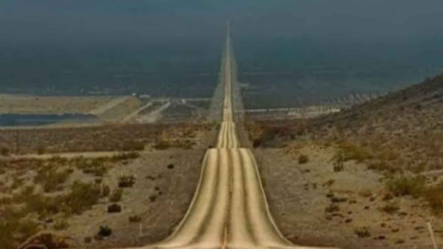 Highway 10 crossing the Empty Quarter desert in Saudi Arabia, the longest straight road in the world with a 240 kilometer stretch.