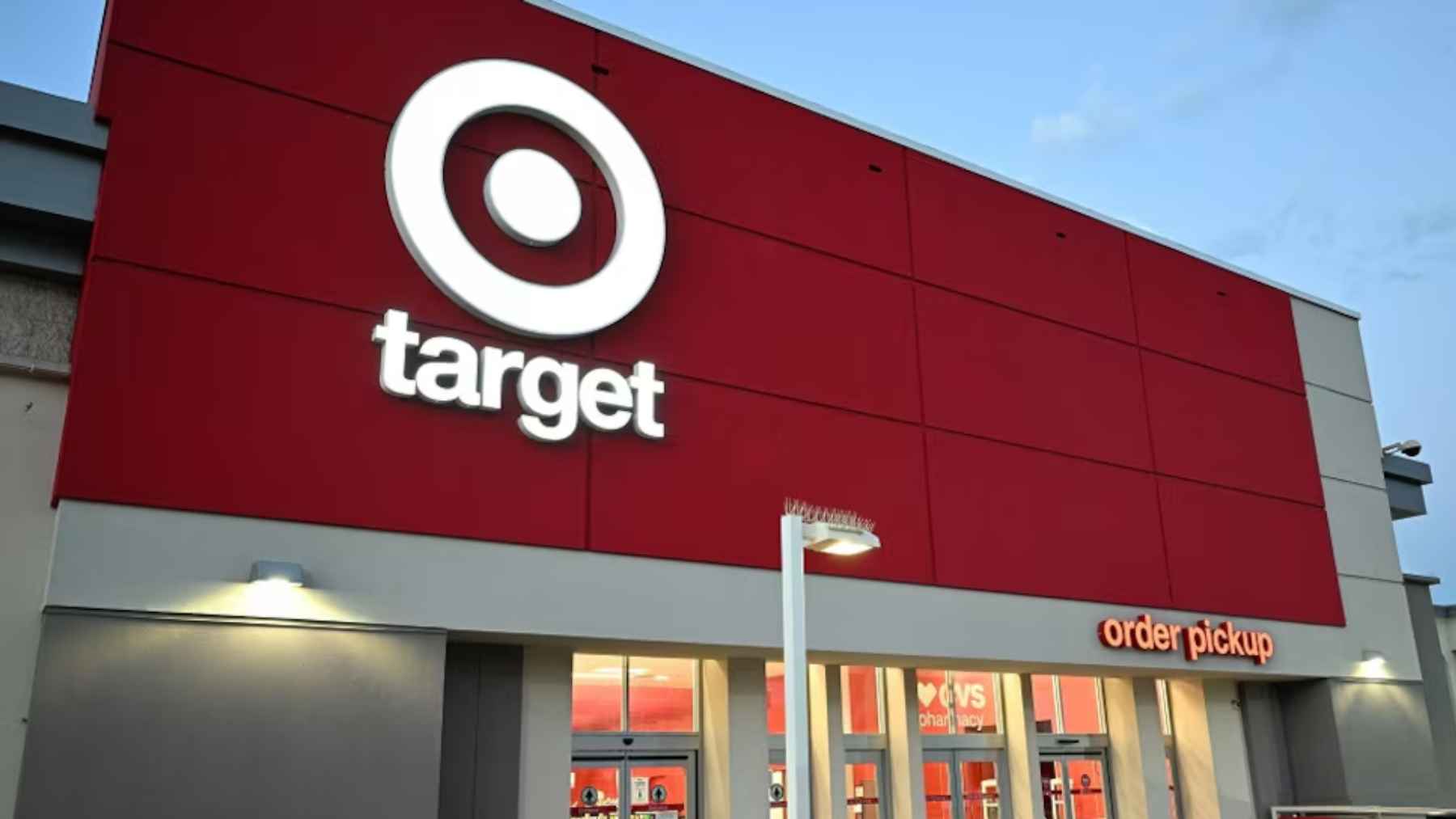 Self checkout station at a Target store linked to a retail theft scheme involving trading cards and low cost items scanned as decoys.