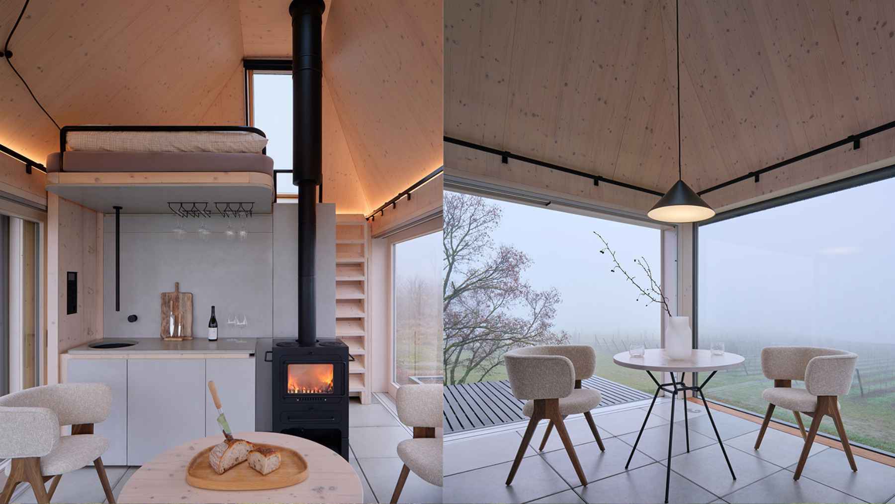 This 215-square-foot off-grid cabin uses terraces, glass walls and solar power to make a tiny footprint feel less like sacrifice and more like escape 1 Interior of a tiny off-grid cabin with loft bed, wood stove, compact kitchen, and large glass windows overlooking nature