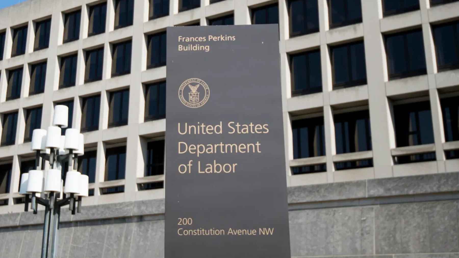 Person searching for jobs online as U.S. jobless claims fall but continuing claims point to slower hiring