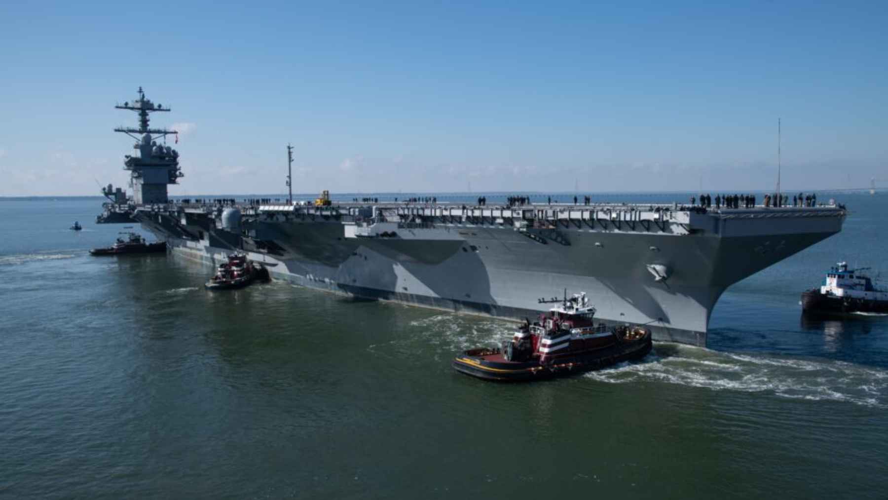 USS Nimitz aircraft carrier sailing at sea during final deployment phase before decommissioning