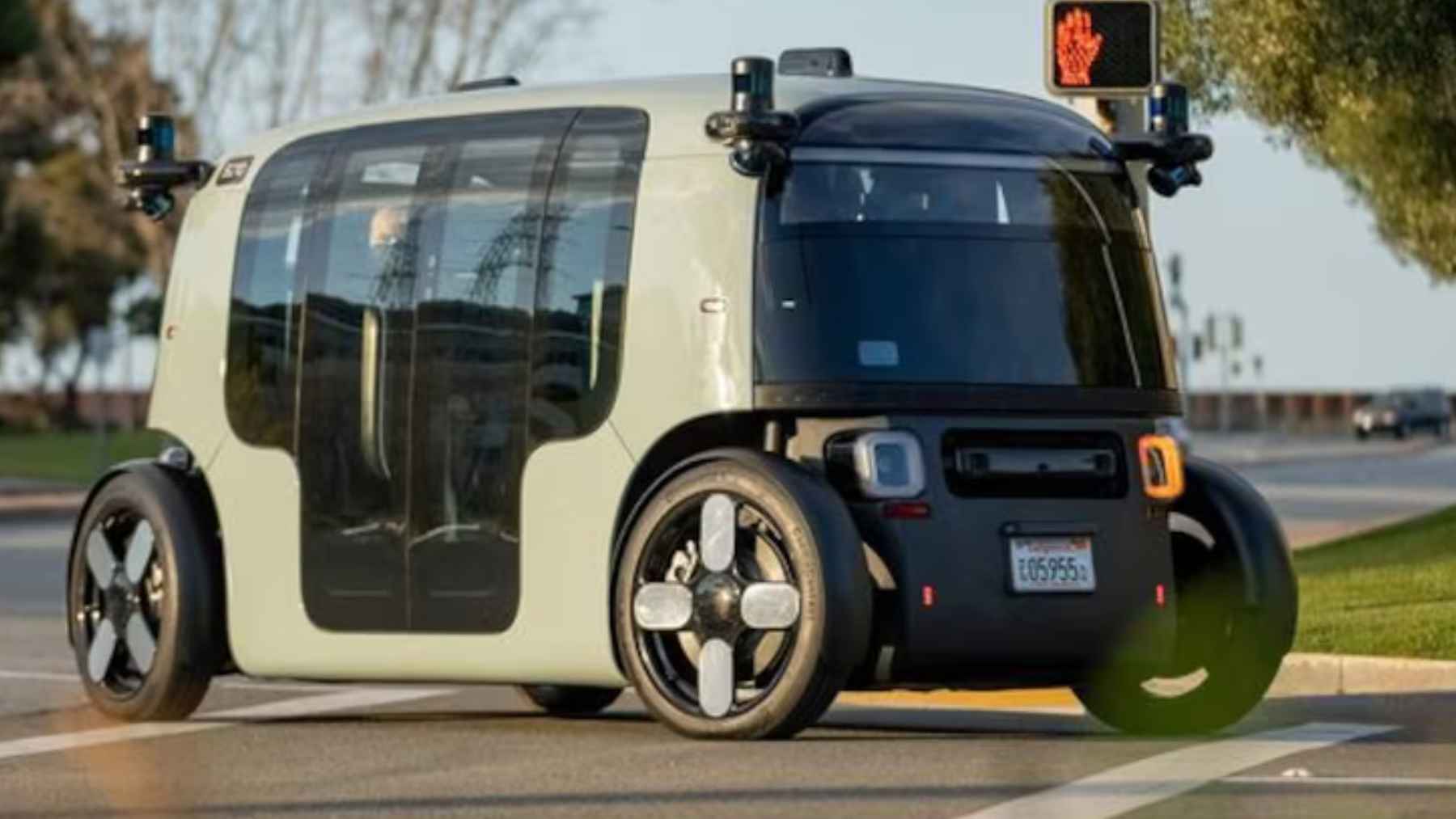 Zoox autonomous robotaxi prototype without steering wheel or pedals during testing in the United States