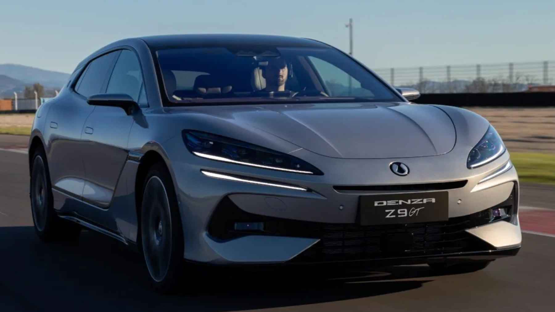 BYD Denza Z9GT electric sedan driving on a track, showcasing a high-performance EV designed for ultra-fast charging