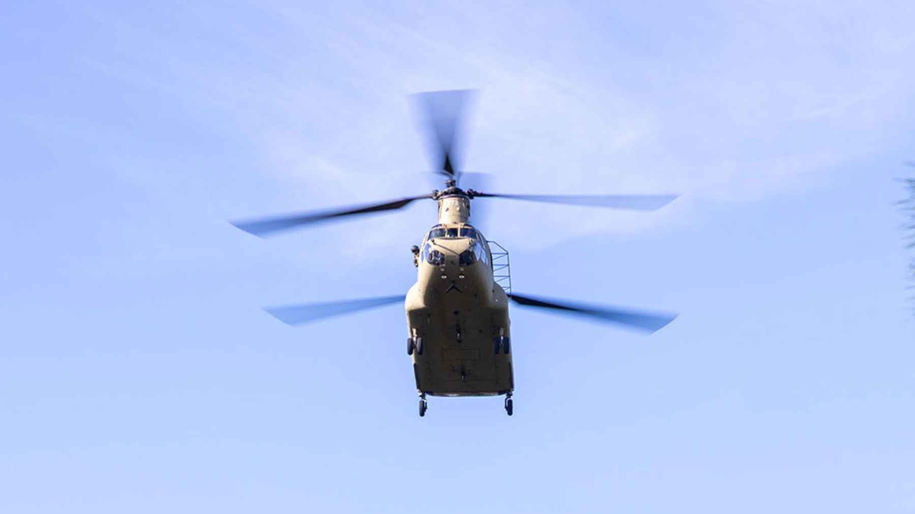 U.S. Army CH-47F Chinook helicopter performing an automated approach and landing using advanced flight control software