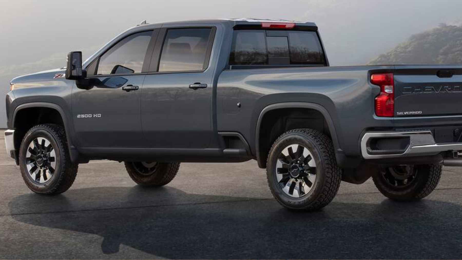 Side view of a Chevrolet Silverado 2500HD heavy-duty pickup truck emphasizing its large size and elevated stance