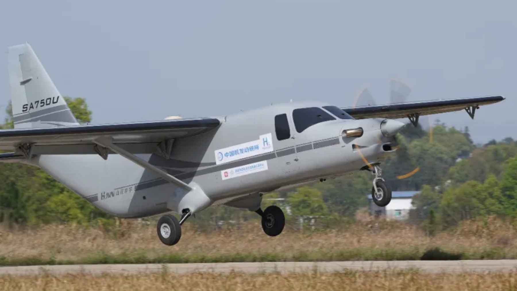 Unmanned cargo aircraft powered by a hydrogen turboprop engine taking off during a test flight in China