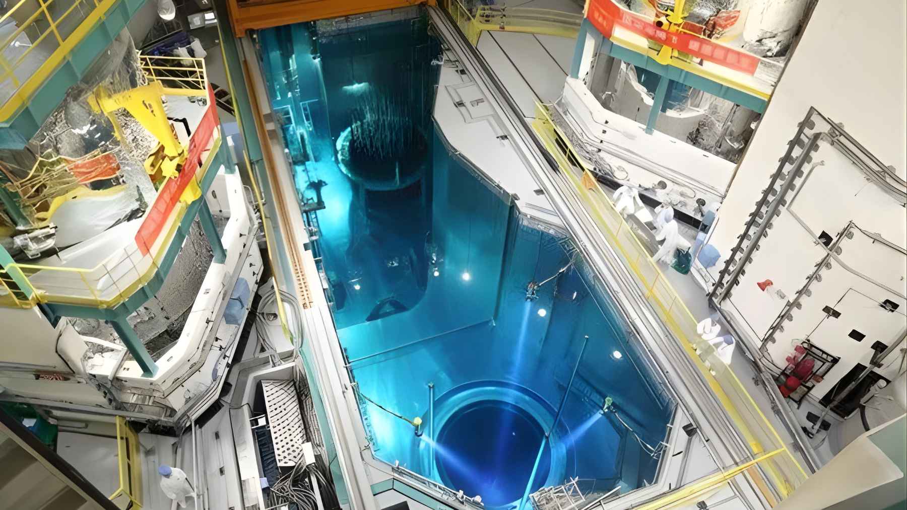 Nuclear power plant under construction in China showing large reactors and infrastructure for energy expansion