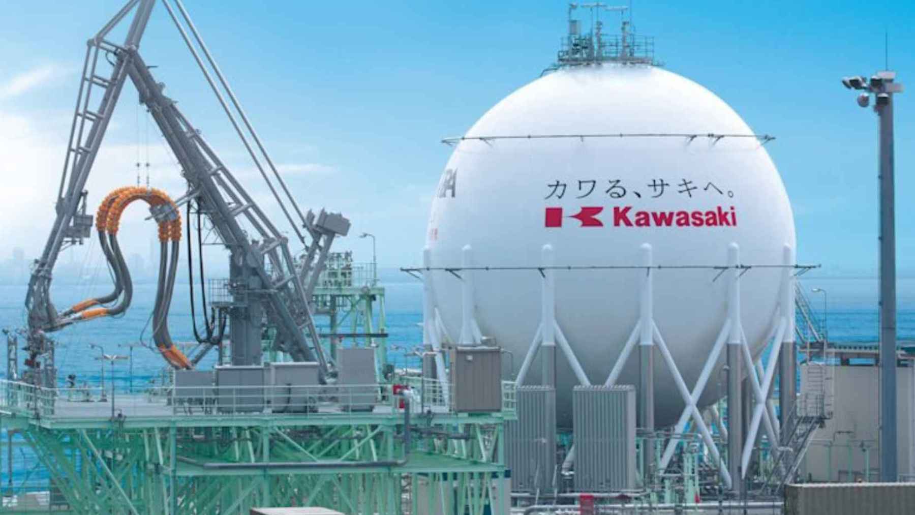 Liquefied hydrogen storage tank and industrial loading system by Kawasaki Heavy Industries at a coastal energy facility in Japan