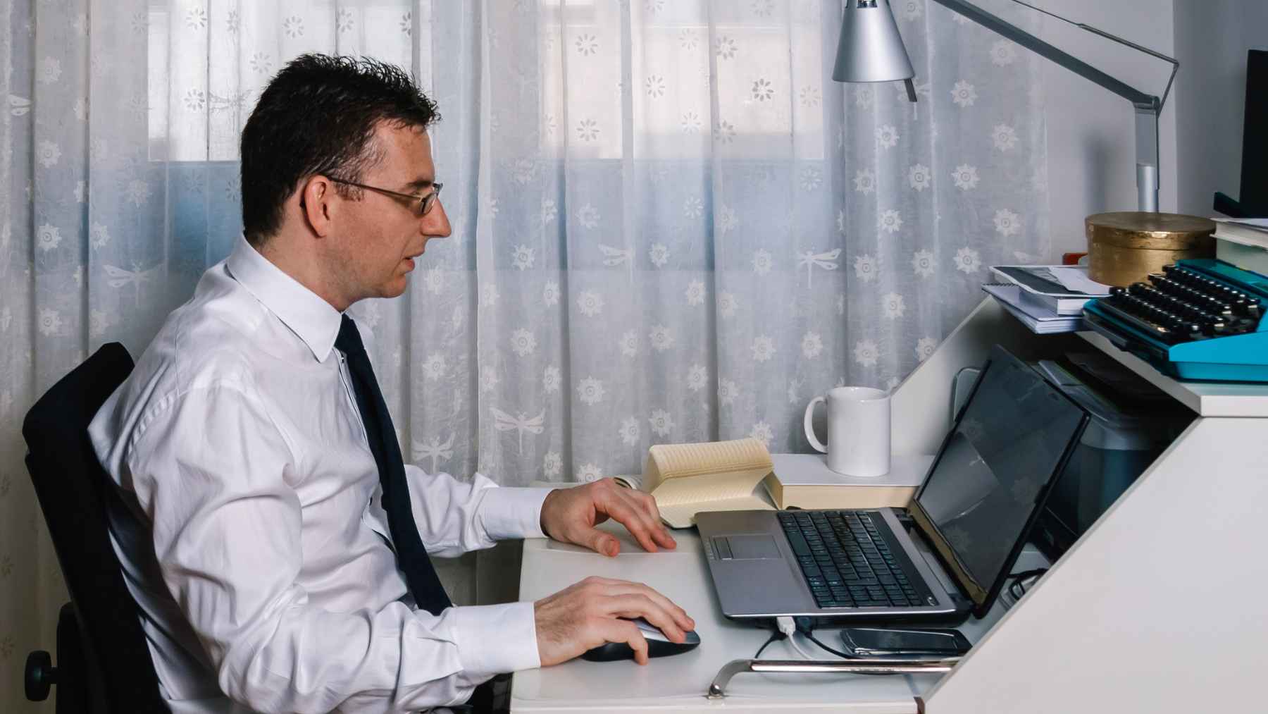 Office workers returning to in-person work as companies tighten policies in a cooling post-pandemic job market