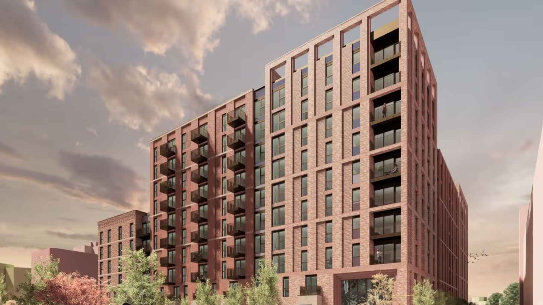 Stretford Mall exterior before demolition, showing a declining shopping center set for redevelopment into housing and park space