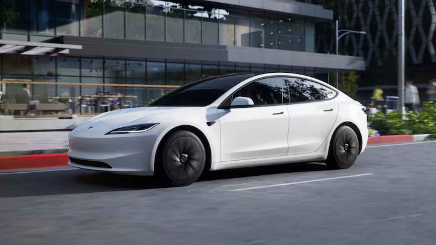 Tesla vehicle using Full Self-Driving supervised system on a European road with driver monitoring active