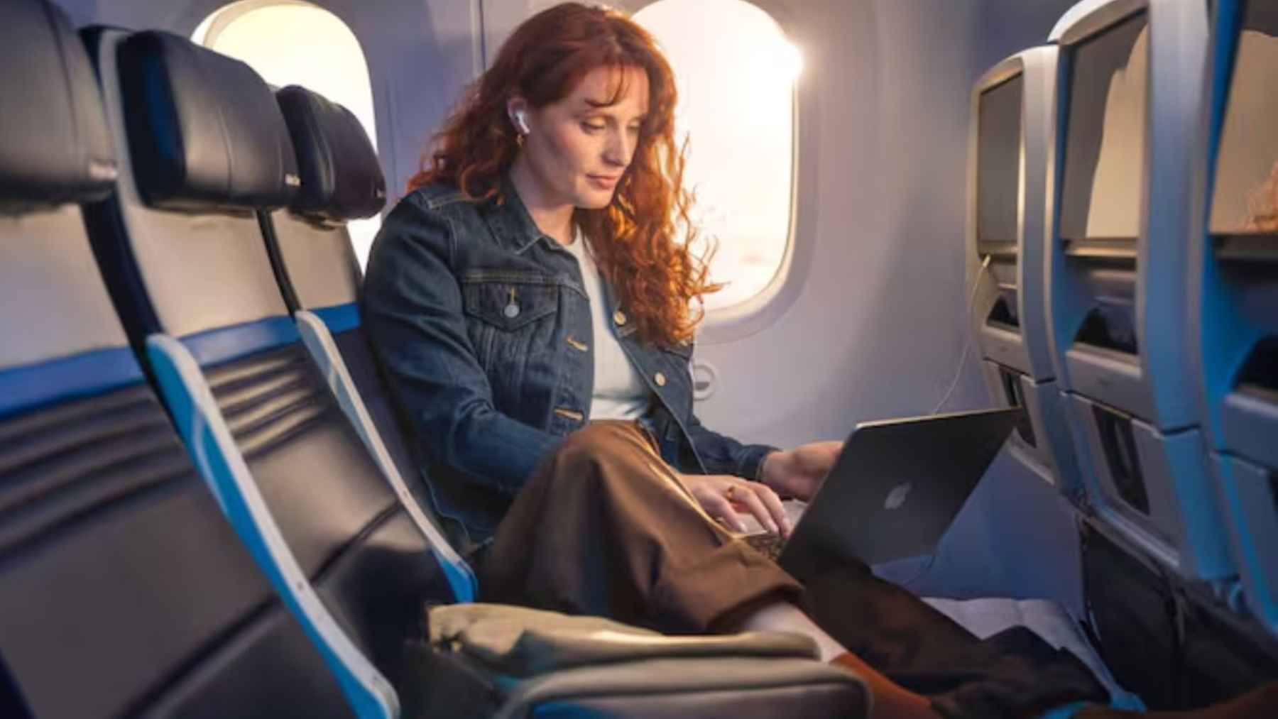 United Airlines economy cabin seats configured to create lie-flat sleeping space for long-haul flights