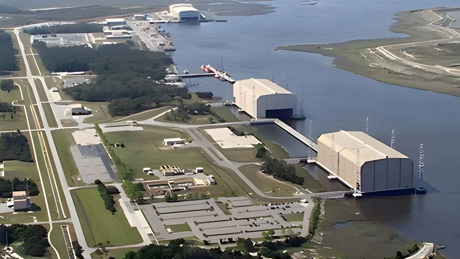 Naval base infrastructure with military ships highlighting U.S. expansion plans in Latin America